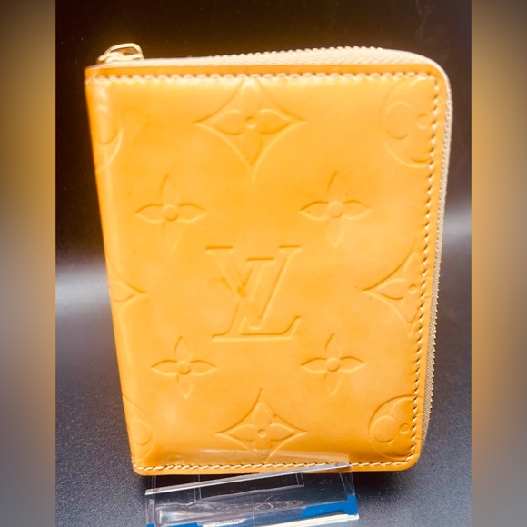 Louis Vuitton Handbags - Louis Vuitton Monogram Vernis Compact Zippy wallet in a yellow patent leather